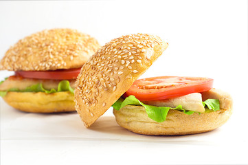 Healthy Burger with chicken and vegetables, lunch box on a white background.