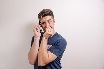 Young man with his cell phone on a call