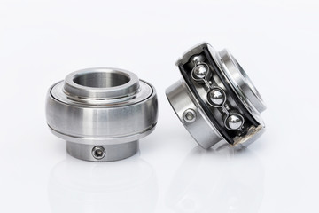 Close-up stainless steel bearings on the white background.