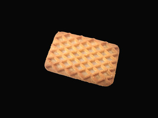 fresh tasty biscuit isolated on black background