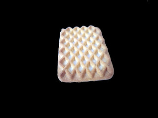 fresh tasty biscuit isolated on black background