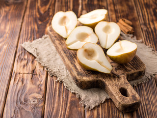 pears for cooking vegetarian dishes on the kitchen table.