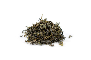 Pile of dry green tea oolong leaves on a white background close-up.