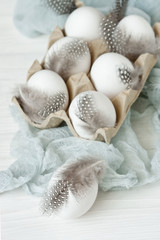 Fresh farm eggs on  wooden rustic background, selective focus
