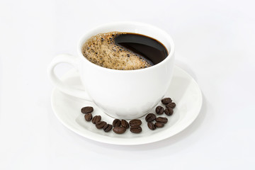 Coffee cup and beans isolated on white background.