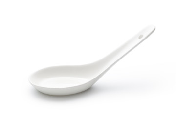Empty ceramic spoon isolated on white background
