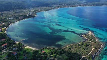 Aerial view of Halkidiki landscape, Vourvourou sandy beach, lagoon with rocks, Kavourotripes beach, Sithonia peninsula. Greece.