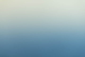 blurred soft gradient blue background  and over is lighting. Use plastic technique to cover the lens