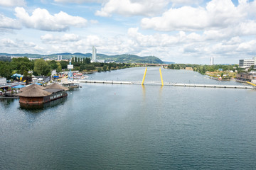Obraz premium Beautiful view of Danube river from bridge in Vienna, Austria, summer day