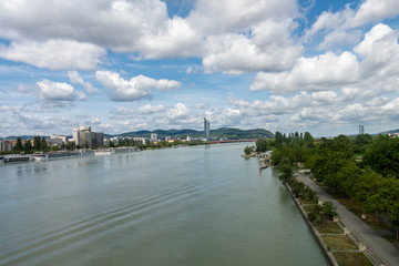 Naklejka na ściany i meble Beautiful view of Danube river from bridge in Vienna, Austria, summer day