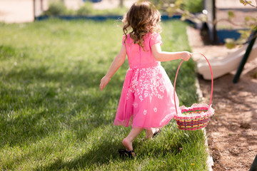 Sisters are having a competitive Easter egg hunt.