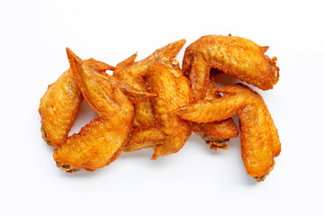 Fried chicken wings on white background.
