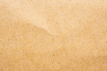 Brown eco recycled kraft paper sheet texture cardboard background