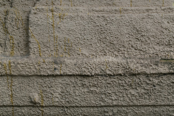 beige rough concrete wall abstract background