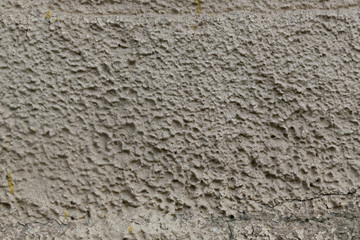 beige rough concrete wall abstract background