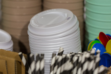 Munich, Bavaria / Germany - Feb 15, 2020: White coffee cup lids / covers. Made of plastic, stacked...