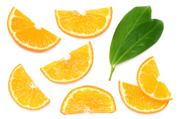 sliced orange with green leaf isolated on white background top view