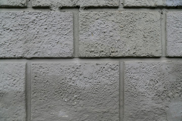 gray rough painted brick wall abstract background