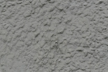 white rough dusty plaster wall