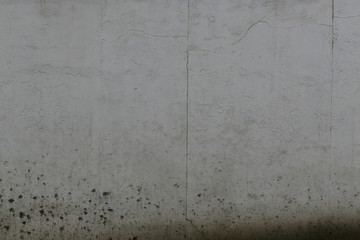 Fototapeta premium gray rough concrete wall surface texture with dirt marks