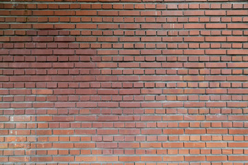 red rough brick wall abstract background