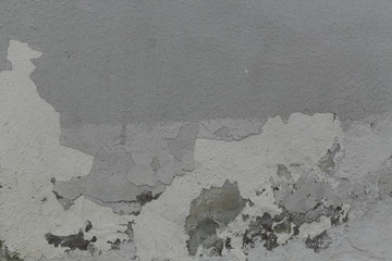 gray painted rough concrete wall surface texture with old pain traces