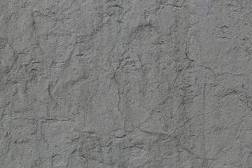 gray painted rough concrete wall surface texture with cracks