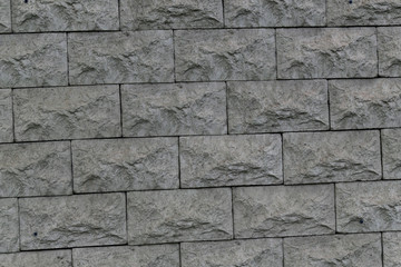 gray rough brick wall abstract background