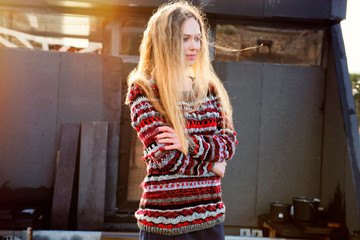 A woman alone meets dawn on a pier, morning meditation in nature