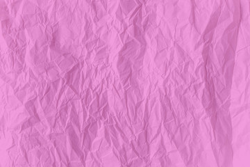 surface pink color crumpled paper close up texture background