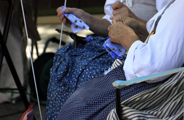 Elderly Women Sewing