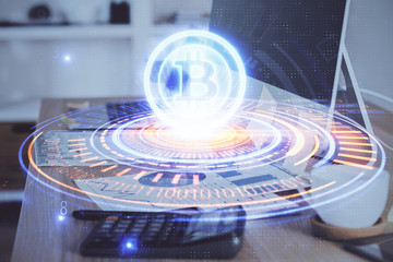 Double exposure of blockchain theme hologram and table with computer background. Concept of bitcoin...