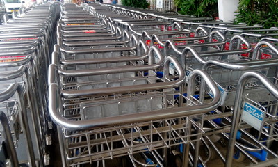 Image of an stainless steel trolley carrier in chennai international airport during an travel...