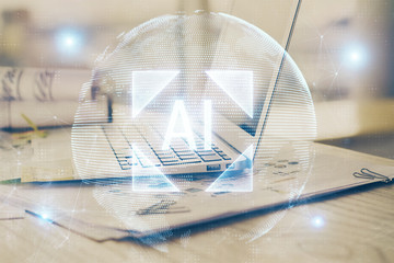 Double exposure of laptop computer and technology theme hologram. Concept of freelance work.