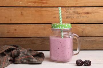 blackberry smoothie in color background