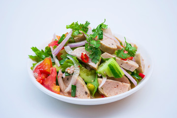 Delicious spicy vietnamese sausage salad with vegetable.