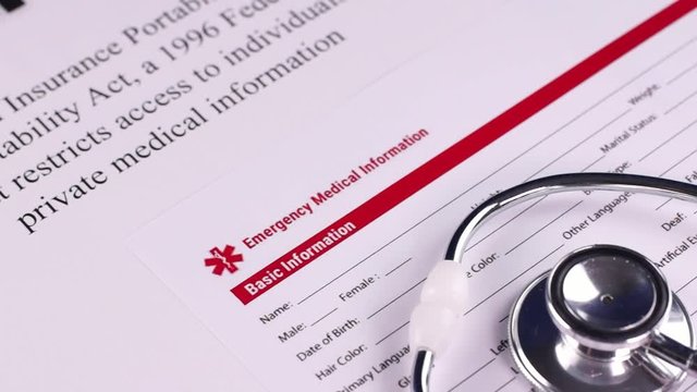 Health Insurance Portability and accountability act HIPAA, emergency medication information form and stethoscope. Close-up
