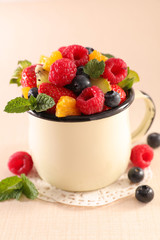 fruit salad- mixed fruit with raspberry,strawberry, orange, banana and blueberry