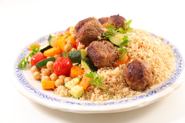 couscous, vegetable and meatball in plate