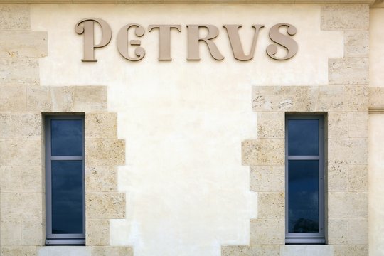 Pomerol, France - June 6, 2017: Facade of Chateau Petrus in Bordeaux region. Petrus is one of the most expensive red wine n the world