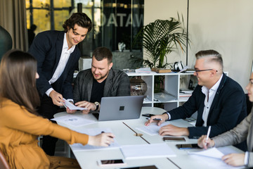 Young business people group have meeting and working in modern bright office indoor