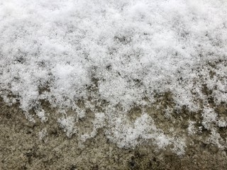 concrete covered with snow and ice