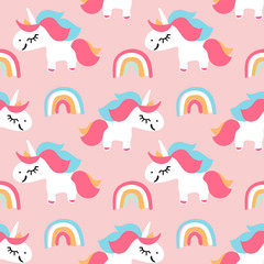 Fototapeta premium Vector seamless pattern with cute unicorns and rainbows on pink background. Magic background for kid wallpaper or greeting card