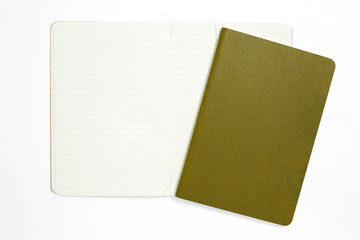 Top view of open stitch blank recycled paper cover notebook on white background.