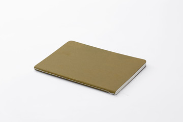 Top view of closed stitch blank recycled paper cover notebook on white background.