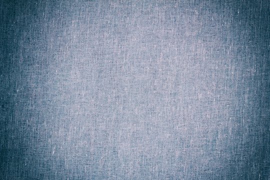 Background Texture Of Light Blue Canvas Fabric With Vignette