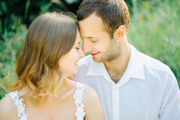 Fototapeta premium happy couple have fun in the park on nature.