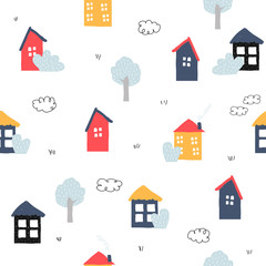Seamless pattern with houses. Cute kids print. Vector hand drawn illustration. © bilaaa
