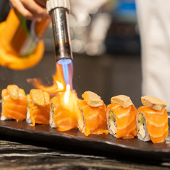 Chef cooking Salmon Foie gras roll,