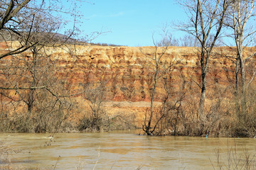 Look on the old tailings Trepca's in Zvecan along river Ibar, Canyon in Kosovo